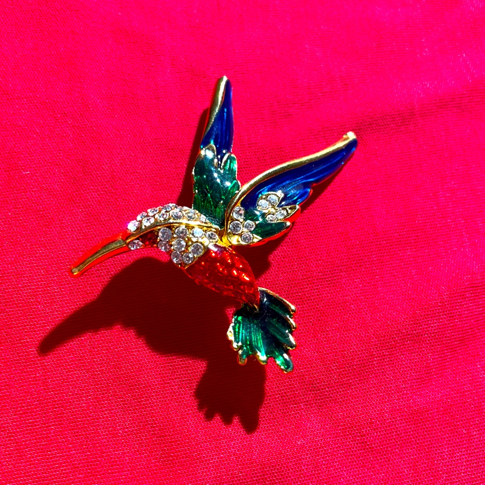 Multi colored bird brooch